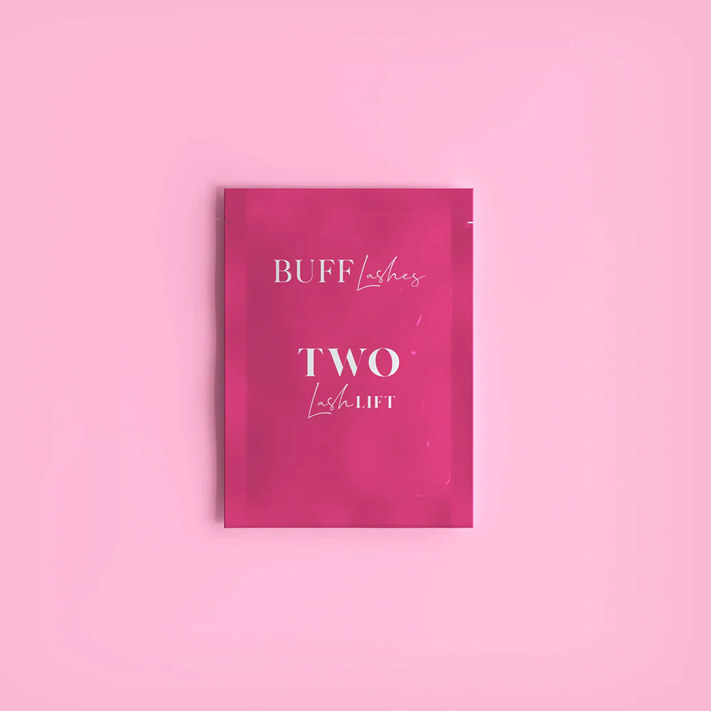 Pink book titled 'BUFF Lashes TWO' on a pink background