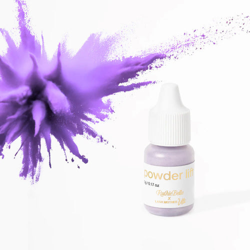 Bottle of purple powder with a splash effect on a white background