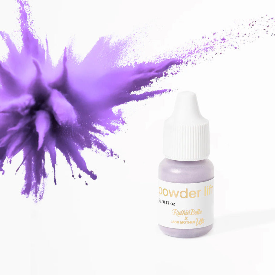 Bottle of purple powder with a splash effect on a white background